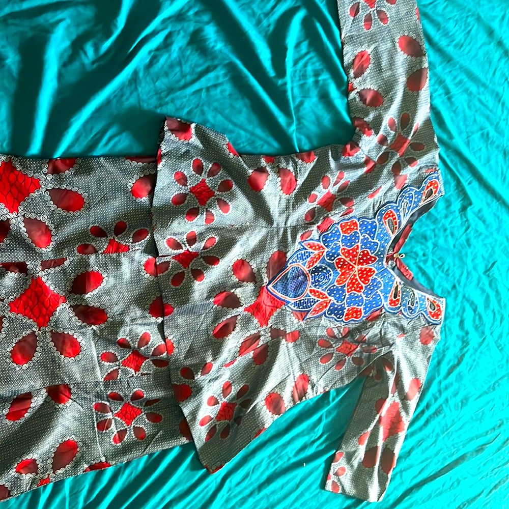 Red and blue traditional African skirt and top